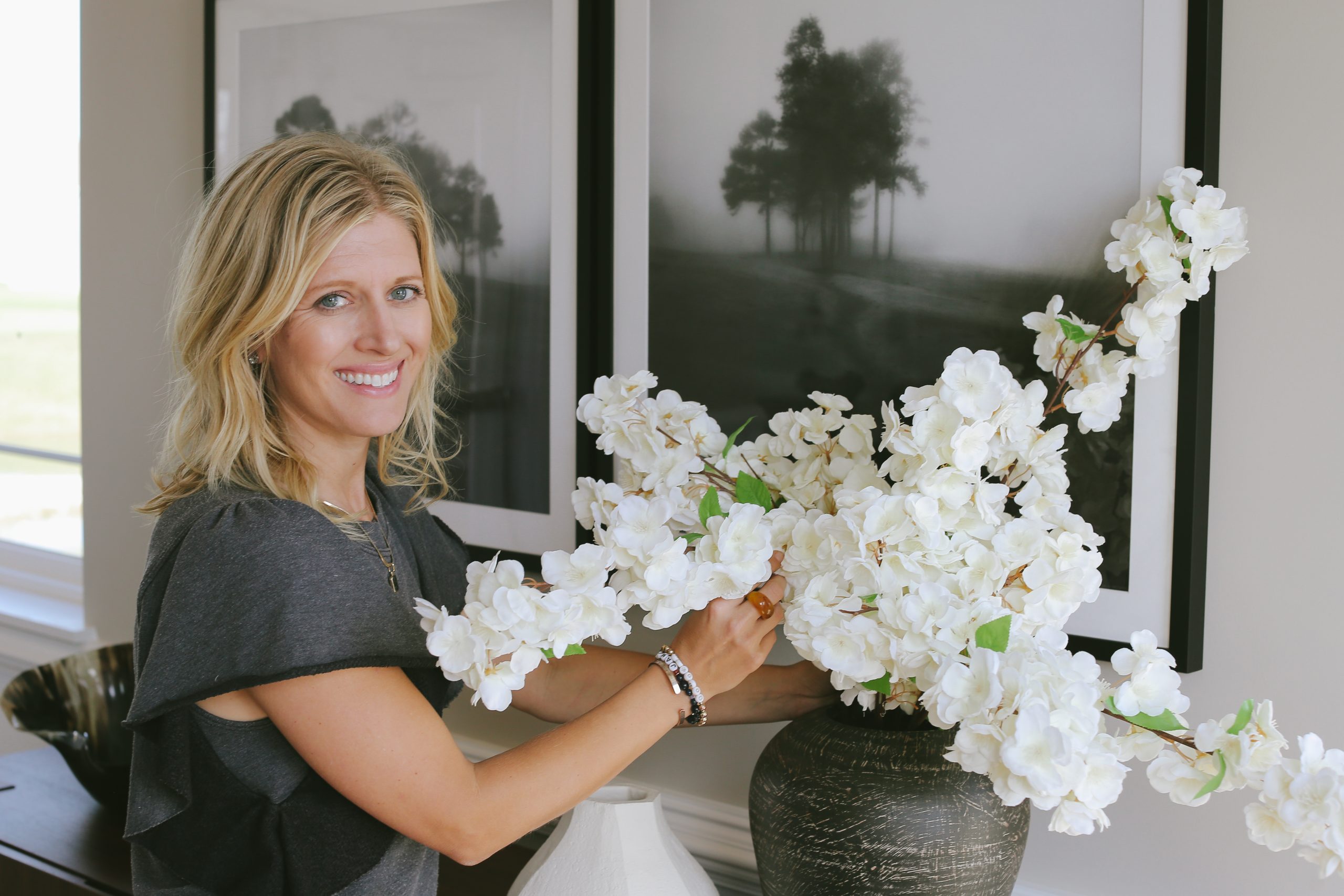 Whitney Vrendenburgh arranging flowers